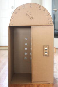 Cardboard toy elevator.