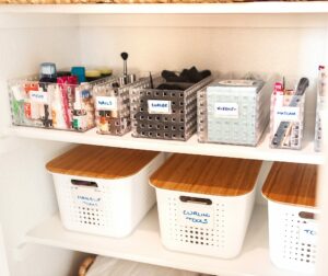 Items organized in baskets in closet.