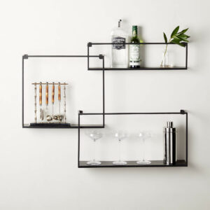 Shelves on wall holding different items.