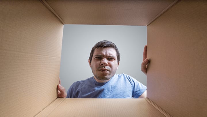 https://cdn.spaceshopselfstorage.com/wp-content/uploads/2020/04/man_looking_into_box_to_figure_out_how_to_prevent_mold_in_storage_containers_ajdda5-2.jpg