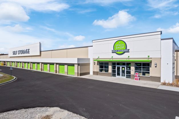 Front of storage facility showing storage units and front entrance.