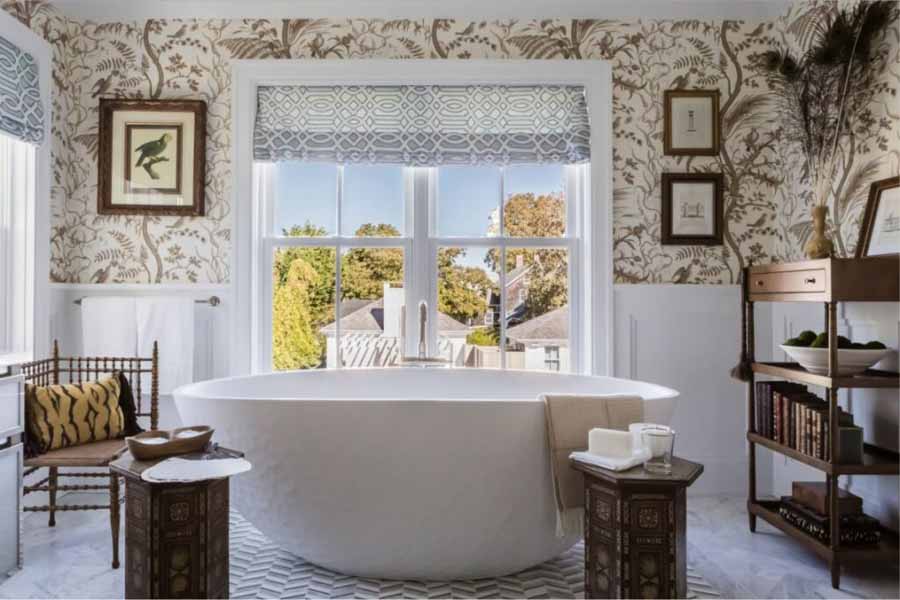 Decorated bathroom with white and brown accents.