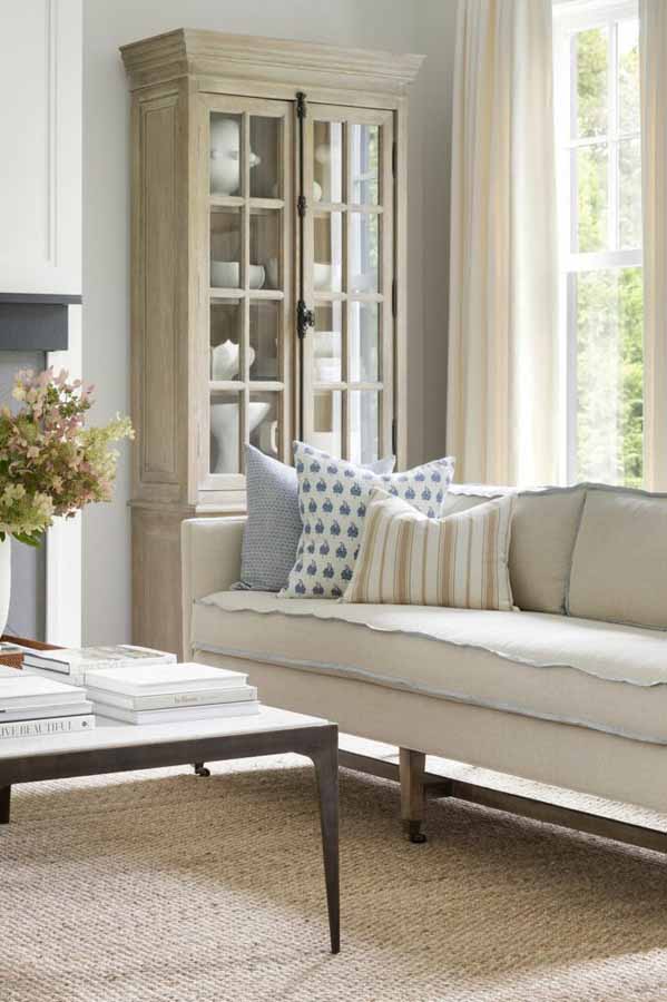 Fully decorated living room with cream accents.